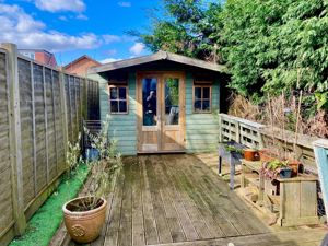 SUMMERHOUSE WITH DECKED SEATING AREA- click for photo gallery
